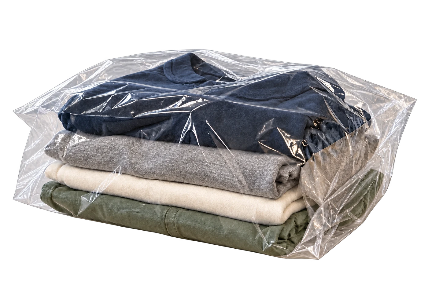 Folded clothes in clear protective packaging, ready for delivery